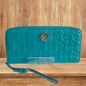 Michael Kors Turquoise Monogram Large Leather zip wallet